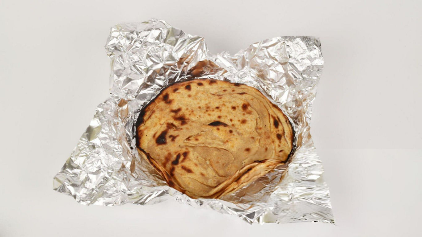 Flatbread wrapped in aluminum foil