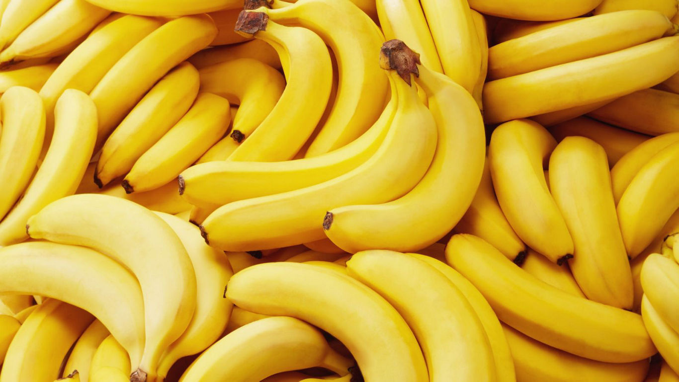 Fresh ripe bananas in vibrant yellow