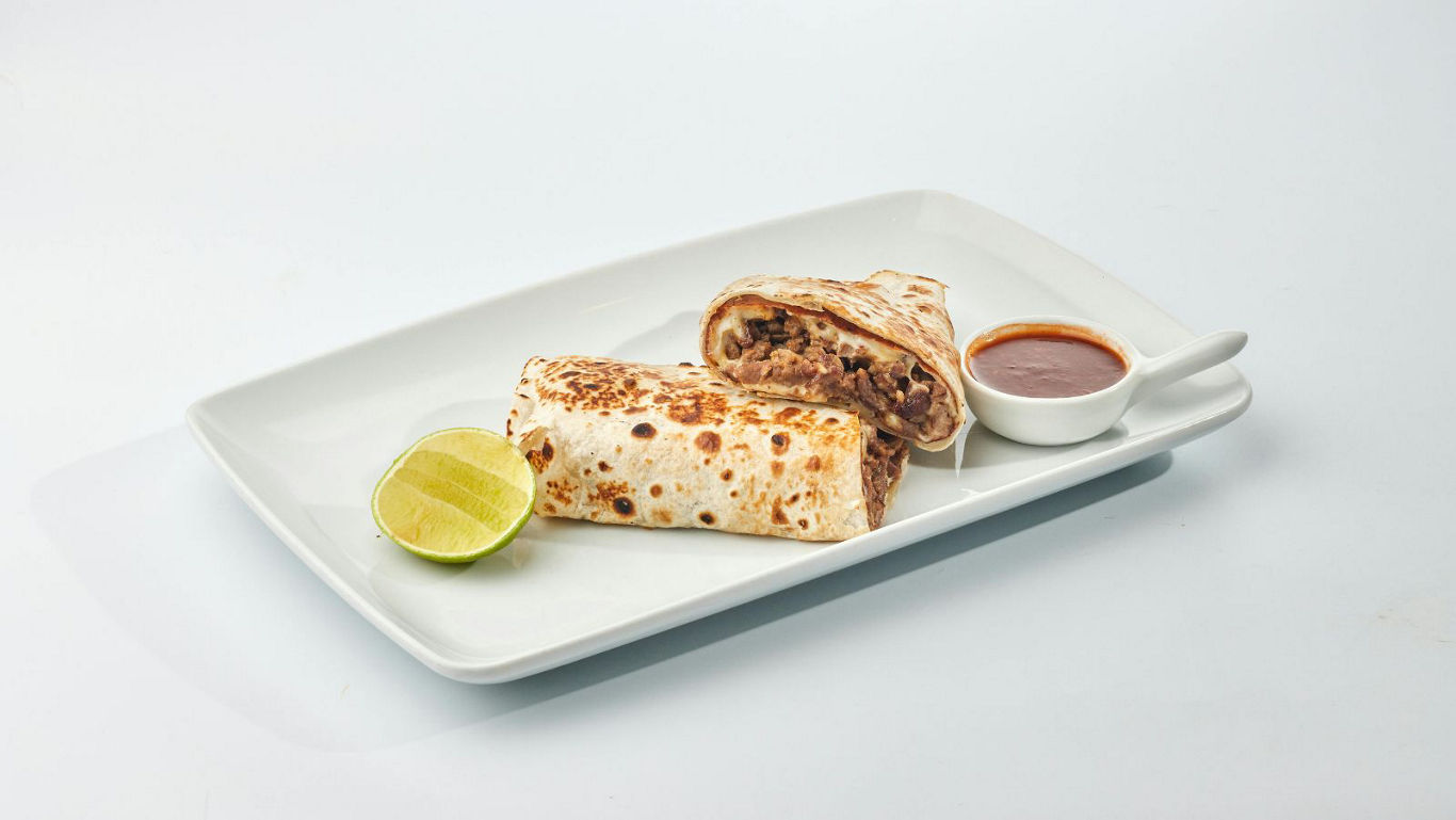 Beef Burrito Halves with Lime and Salsa
