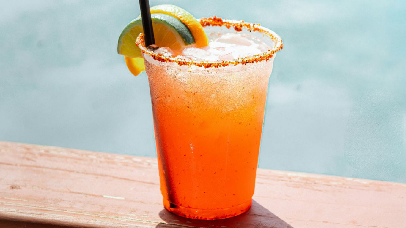 Refreshing citrus drink with chili rim