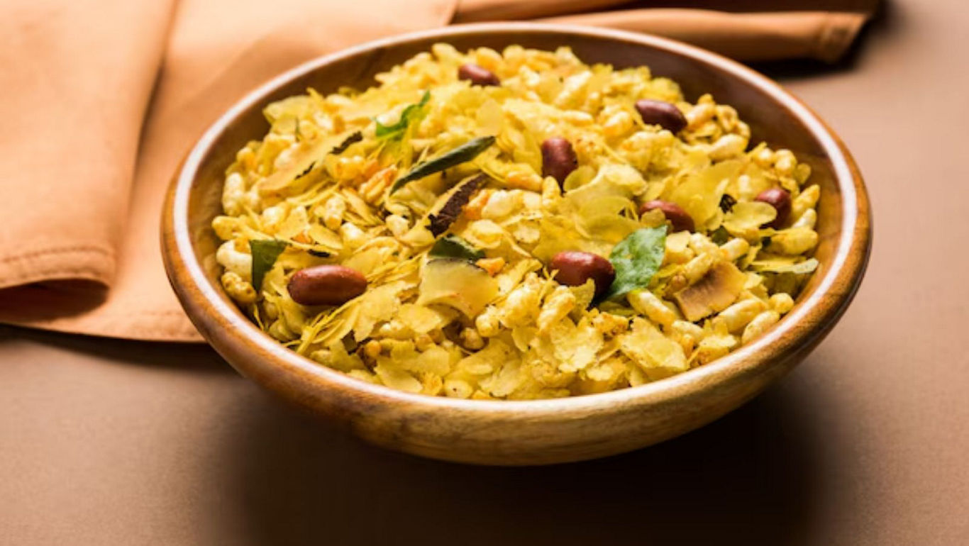 Traditional Indian snack mix in wooden bowl