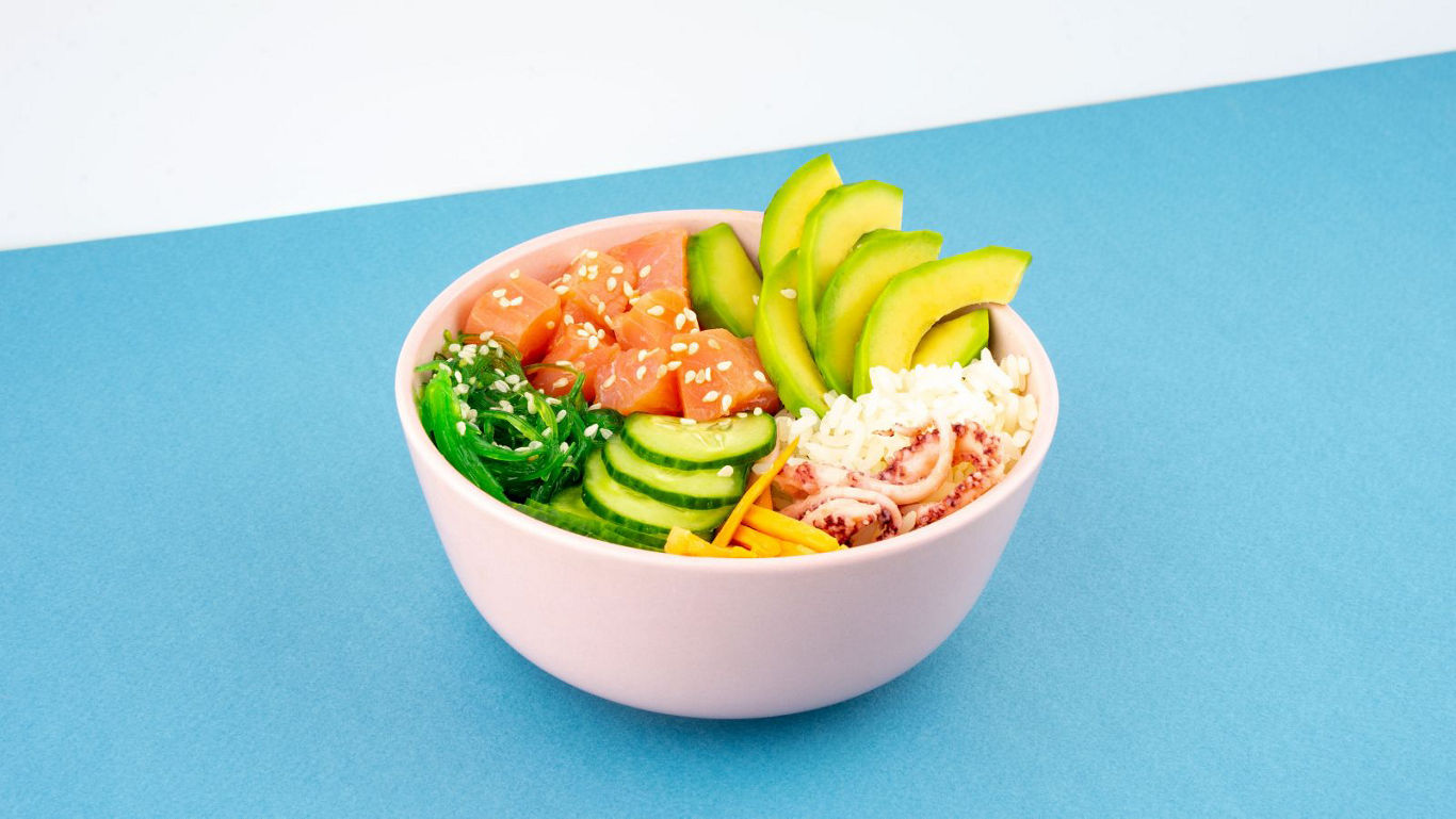 Colorful salmon poke bowl with avocado