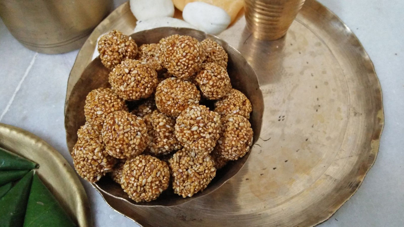 Traditional sesame sweet balls on brass plate