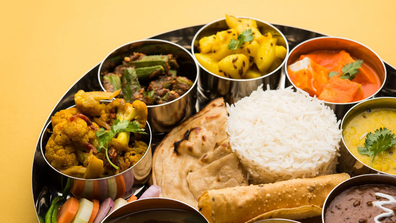 Traditional Indian thali with assorted dishes