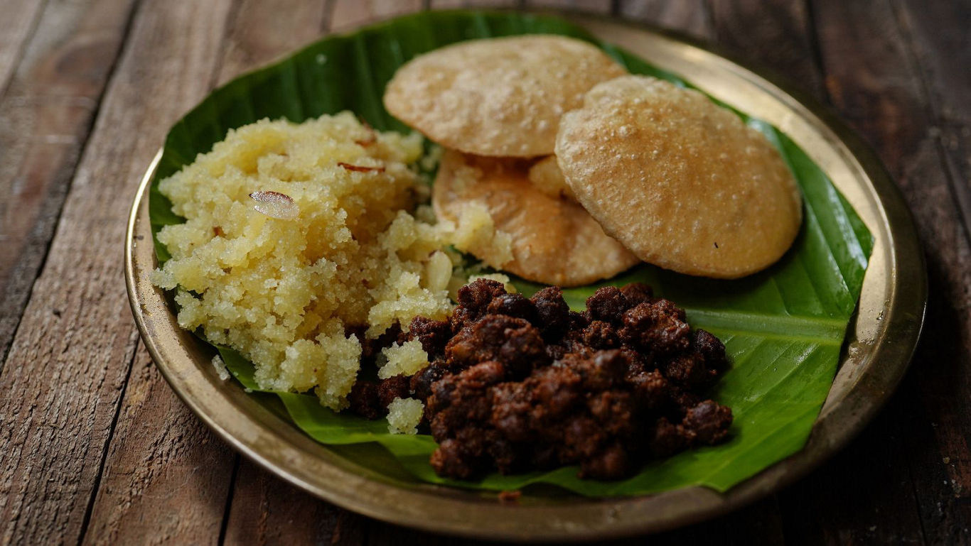 Traditional Indian meal served on banana leaf