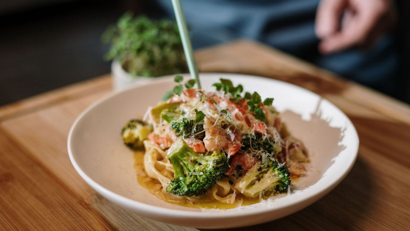 Creamy pasta with broccoli and salmon