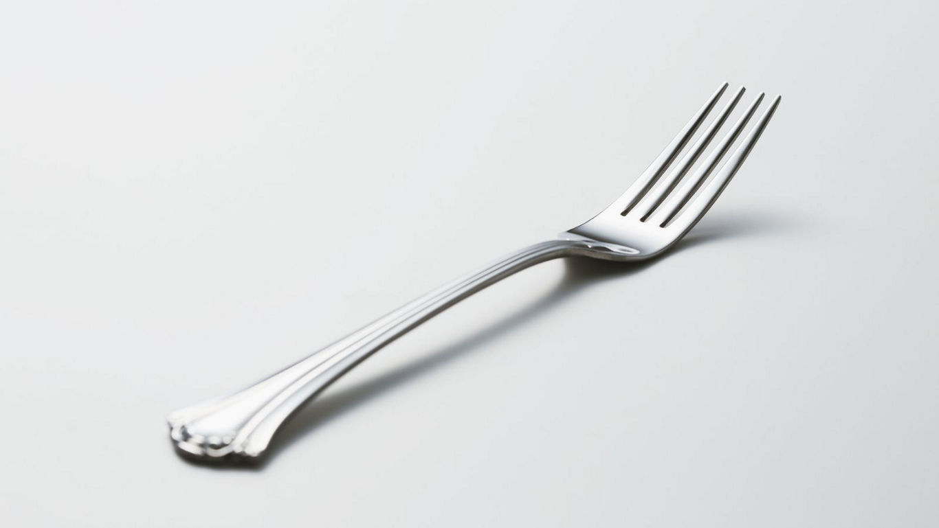 Stainless Steel Fork on White Background
