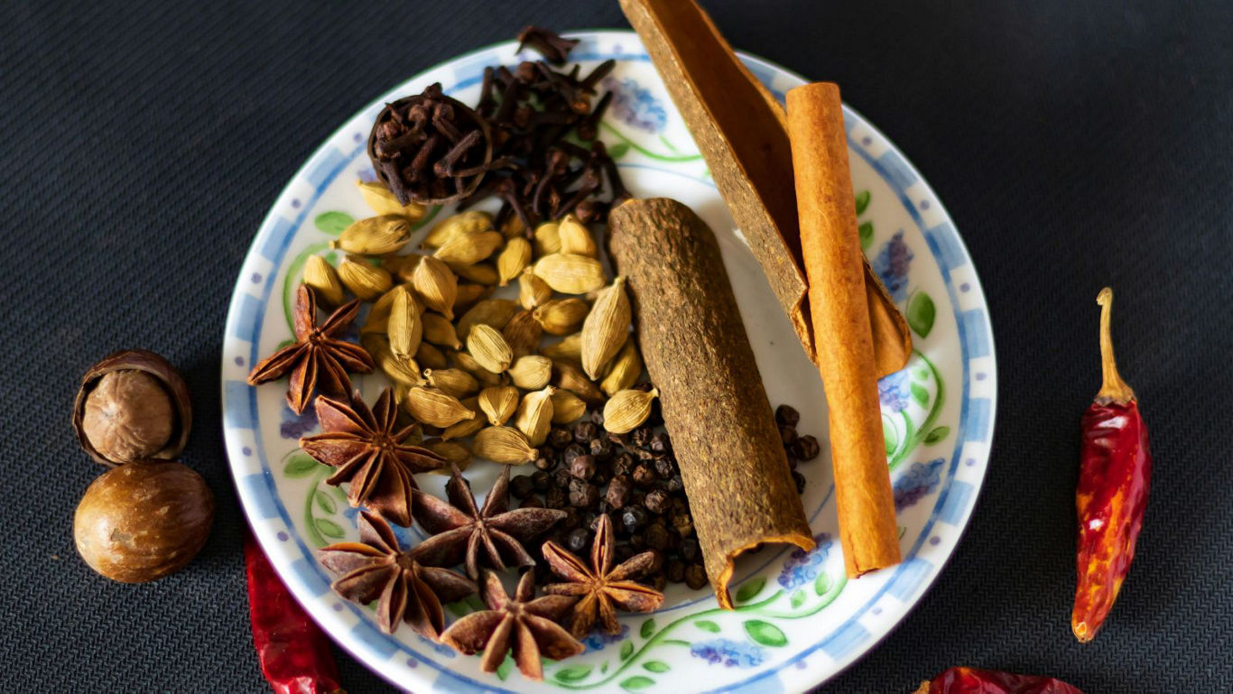 Assorted Whole Spices on Decorative Plate