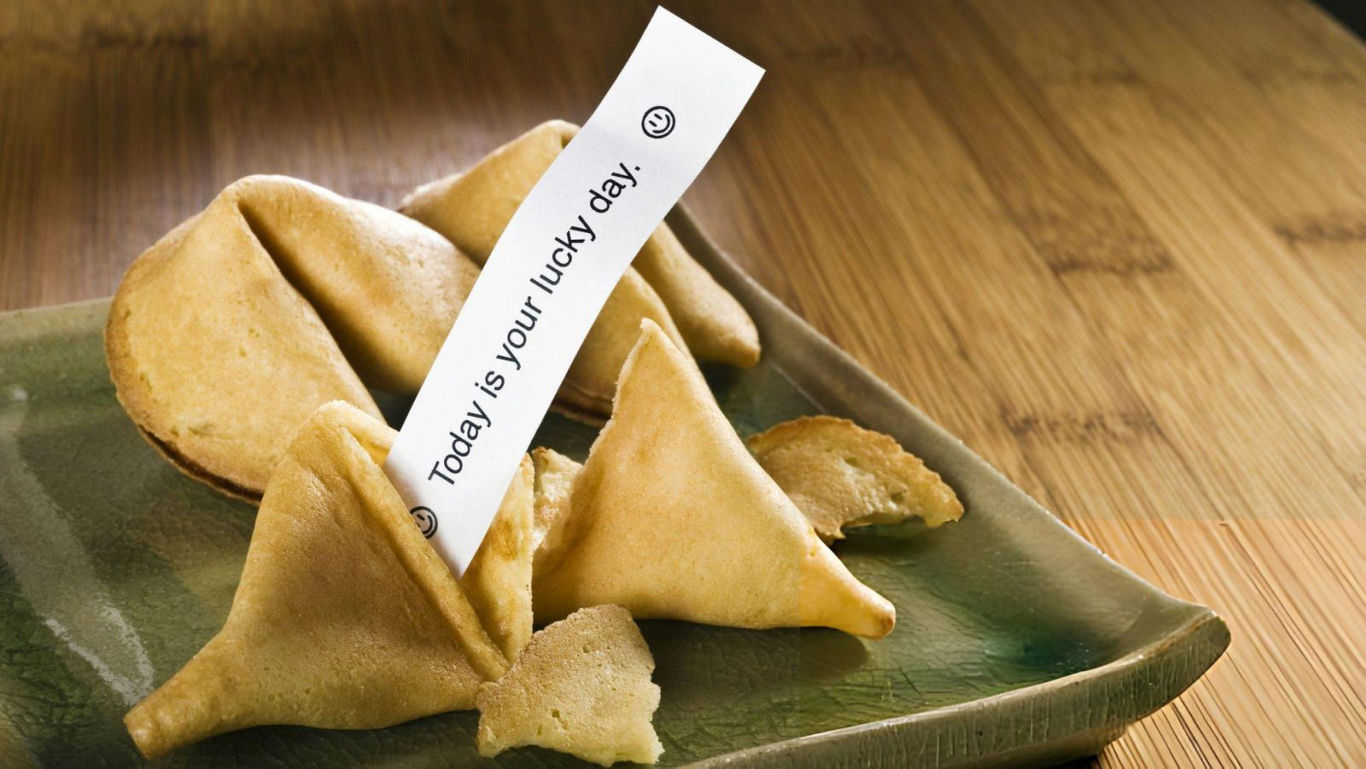 Fortune cookies with lucky message displayed
