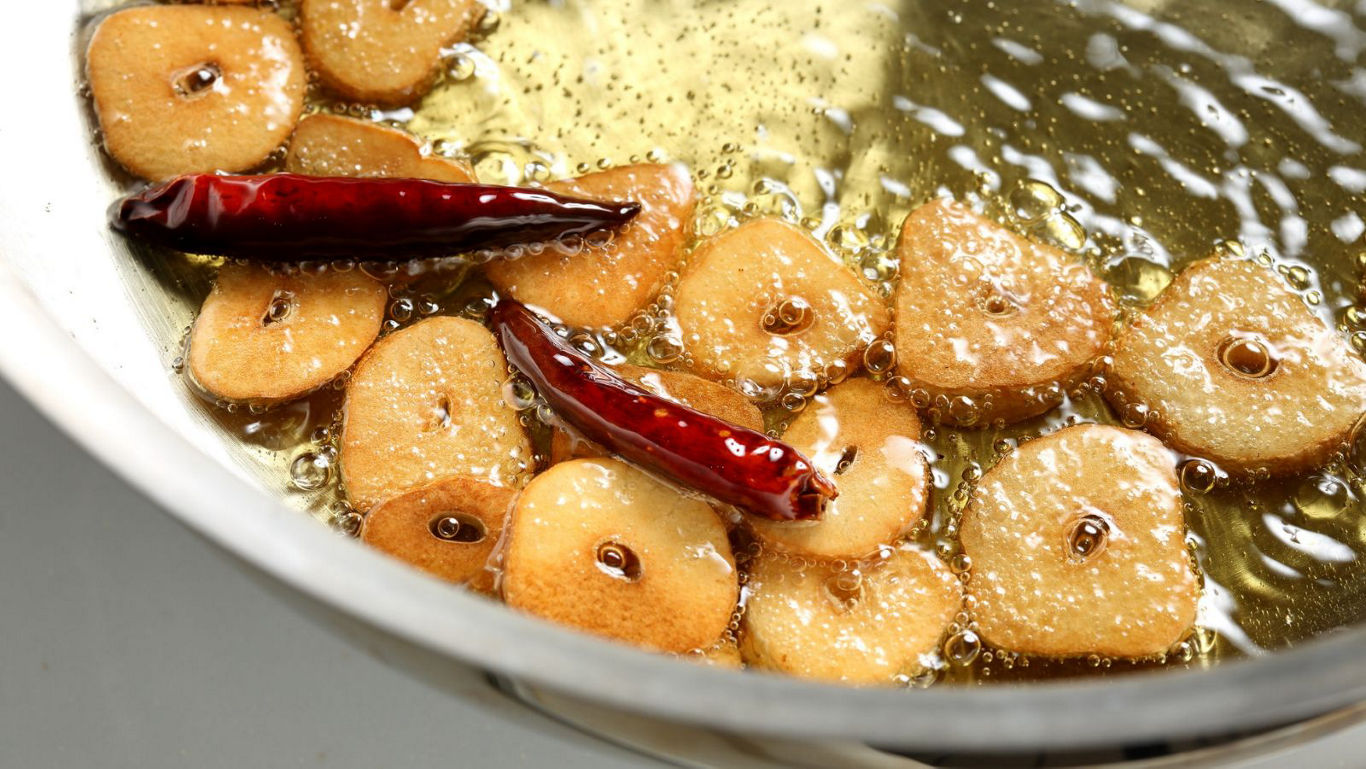 Sliced Garlic and Chili Frying in Oil