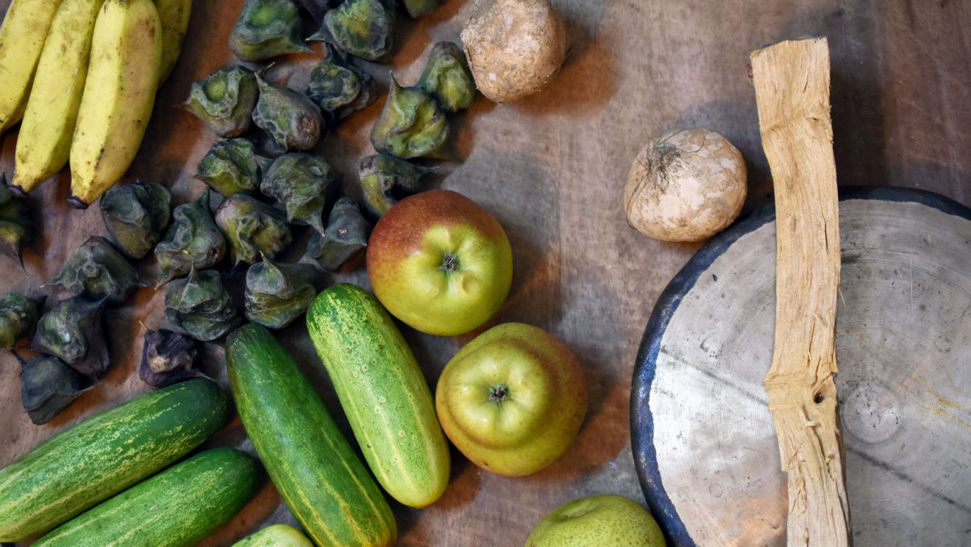 Assorted fresh produce on rustic tabletop