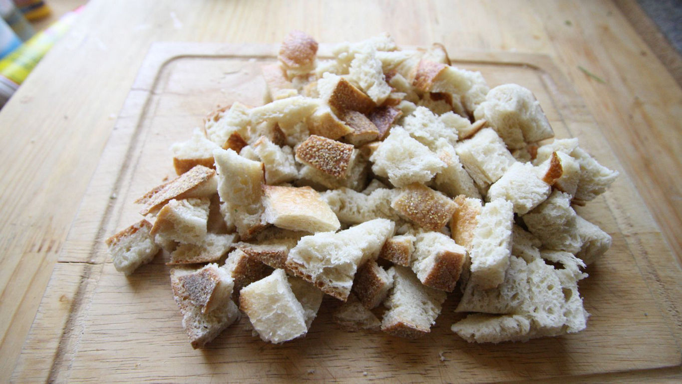 Chopped Bread Pieces on Wooden Board