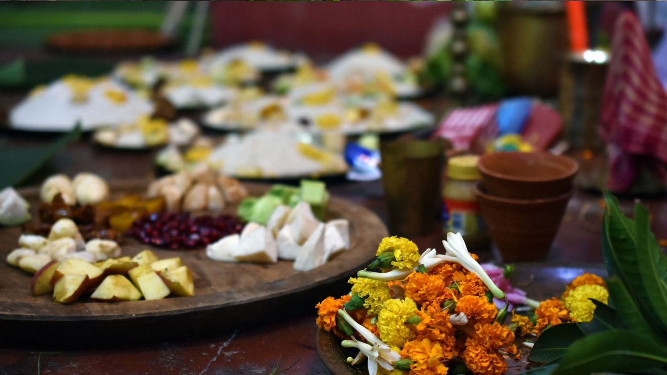 Traditional offering with flowers and food