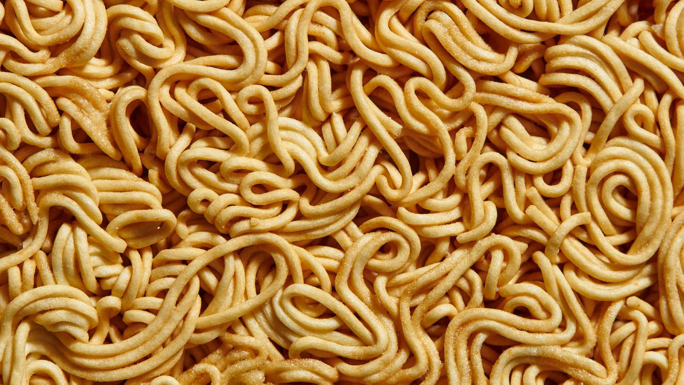 Close-up of Uncooked Instant Noodle Block Texture