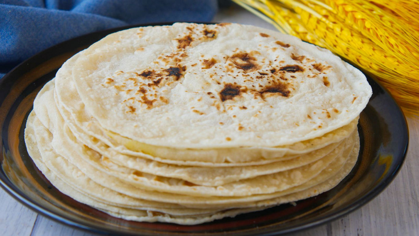 Stack of Fresh Flour Tortillas on Plate