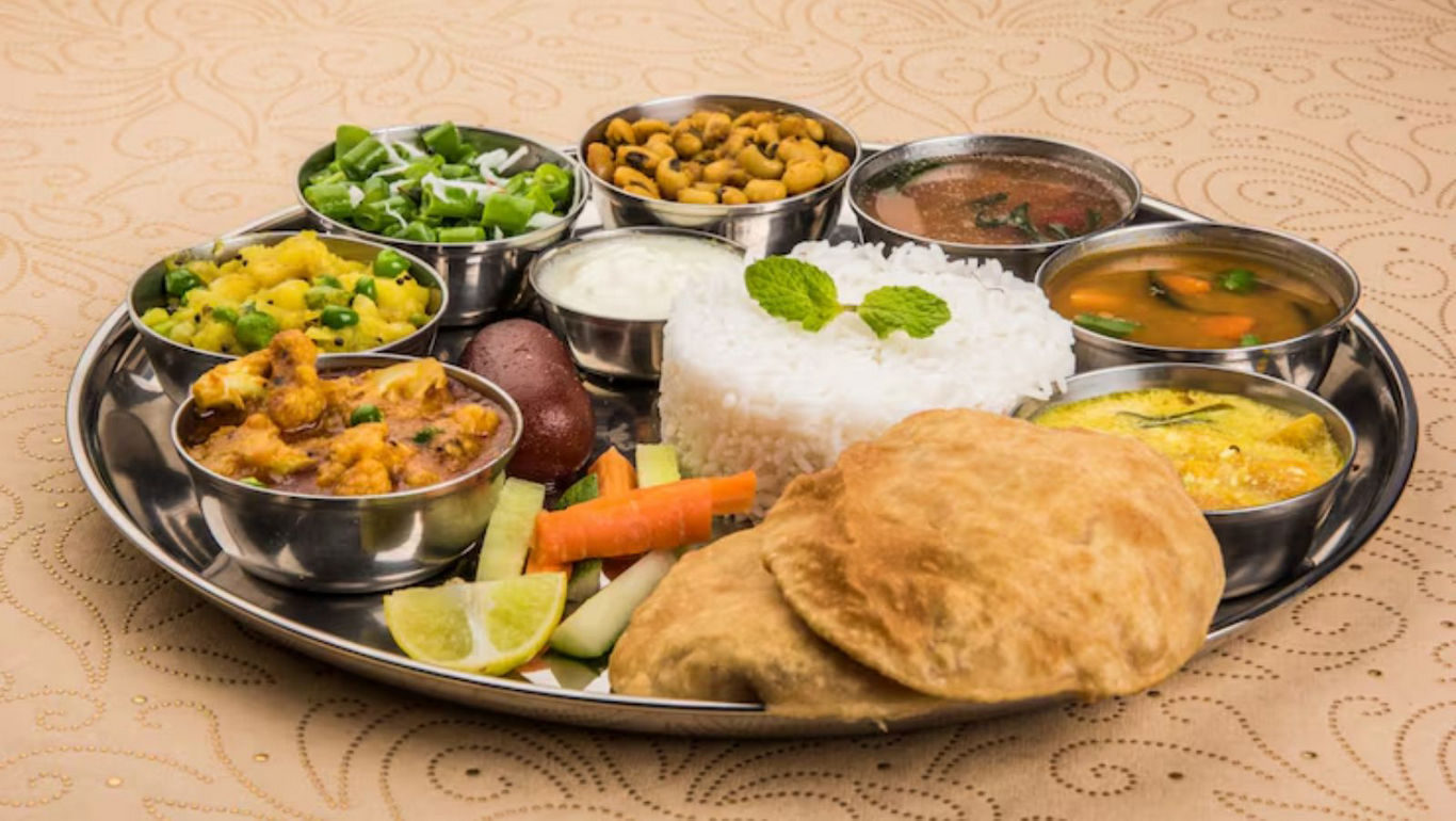 Traditional Indian thali with assorted dishes
