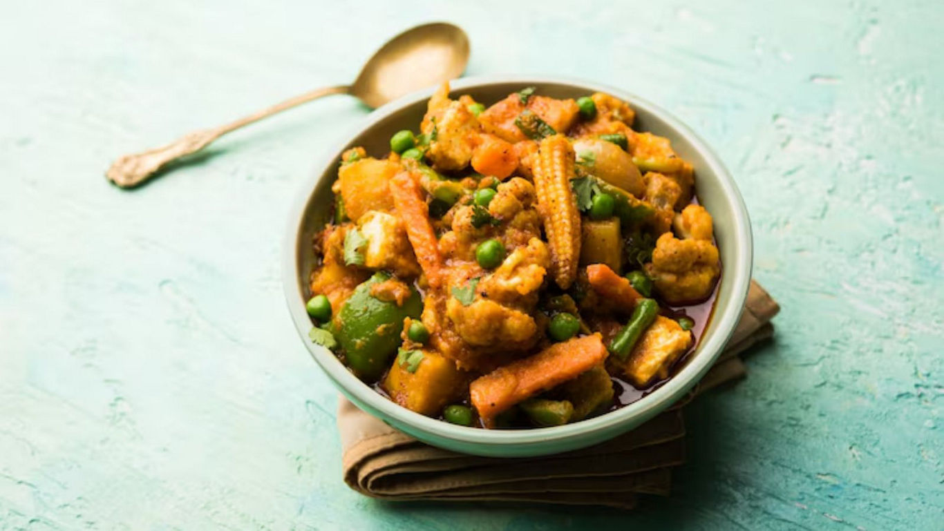 Bowl of Mixed Vegetable Curry on Table
