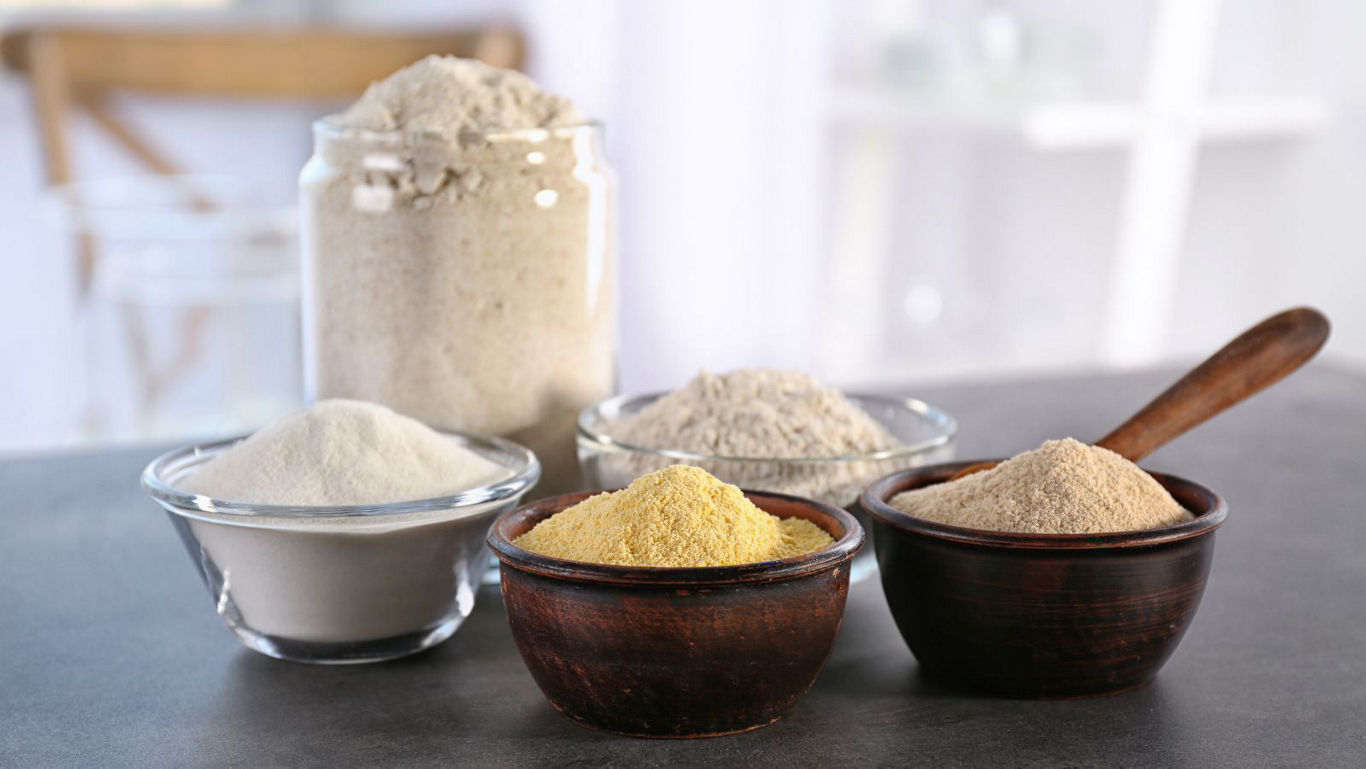 Assorted grain flours in small bowls
