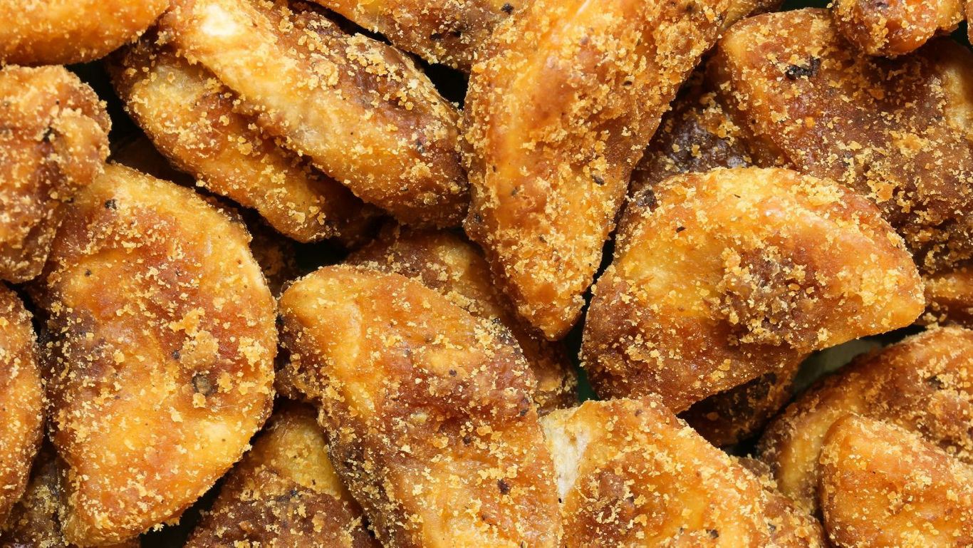Close-up of crispy breaded chicken pieces