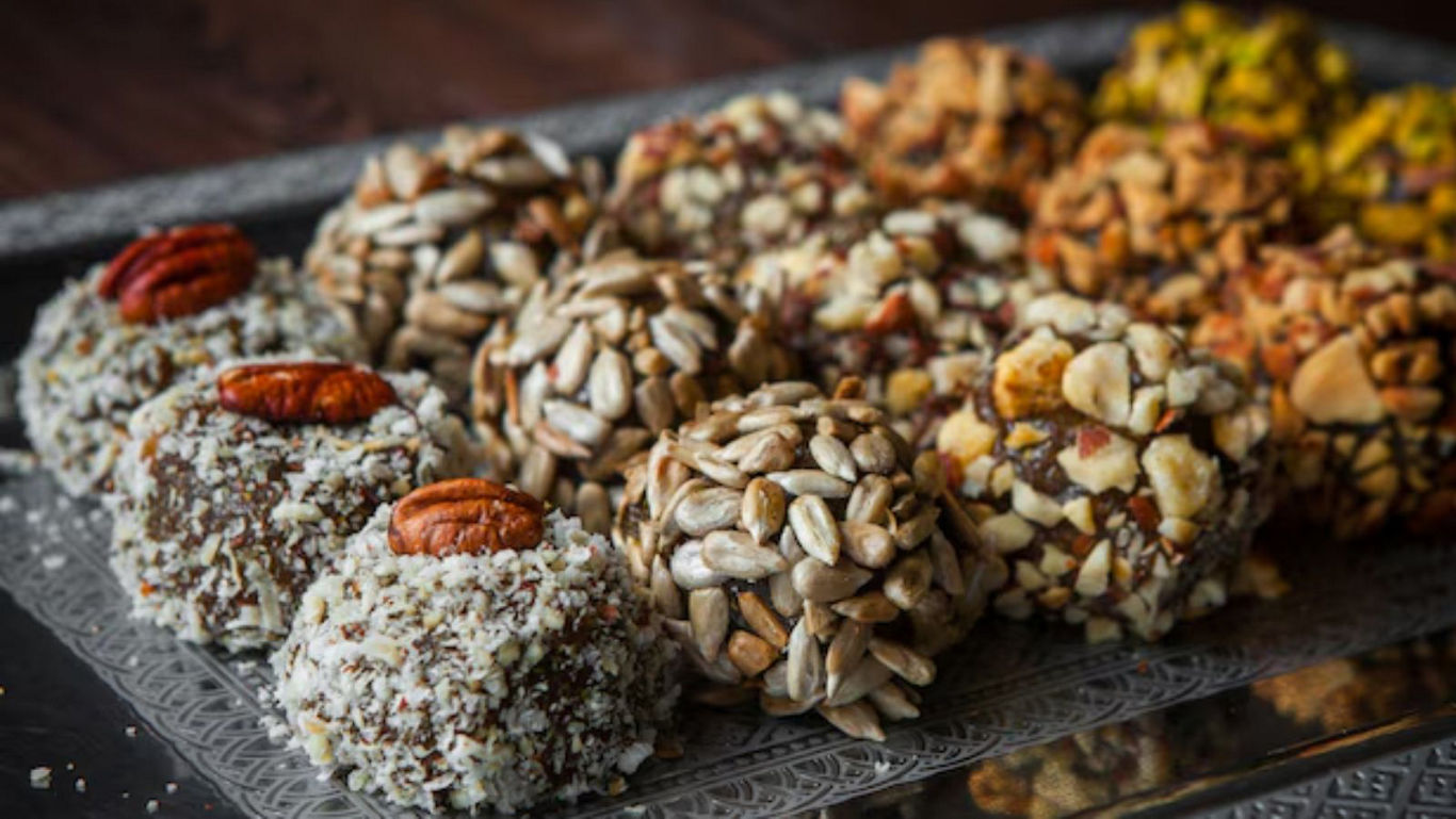 Assorted Nut-Covered Chocolate Truffles on Tray
