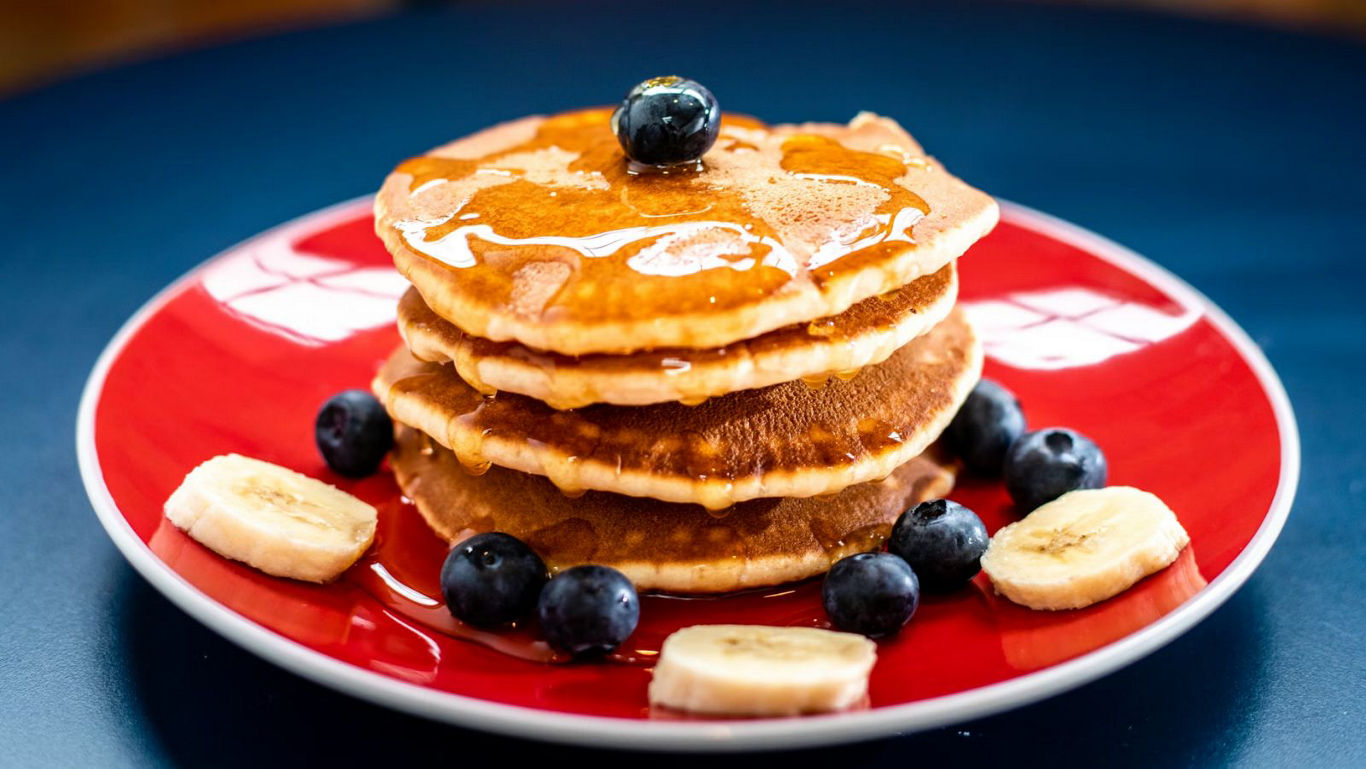 Stack of Pancakes with Blueberries and Bananas