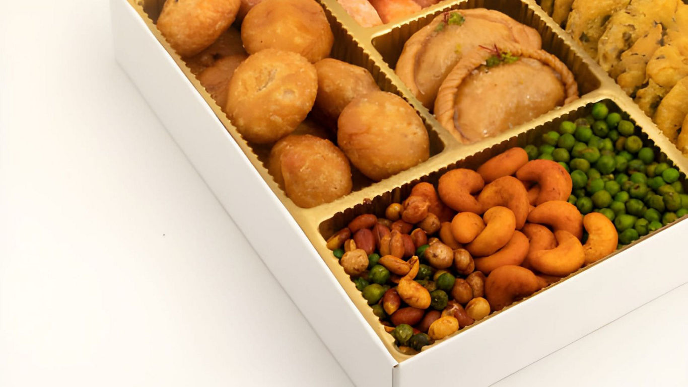Assorted Indian snacks in a box