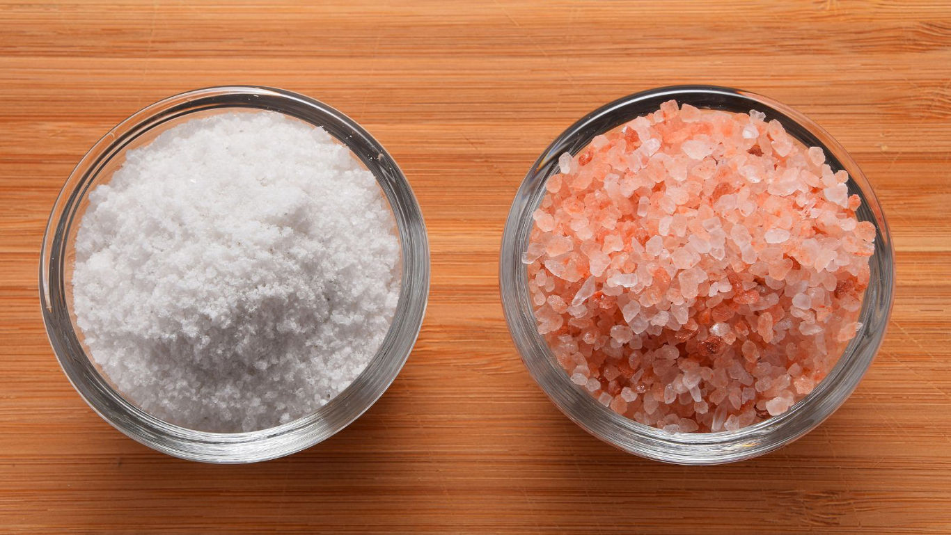 White and pink salt in glass bowls