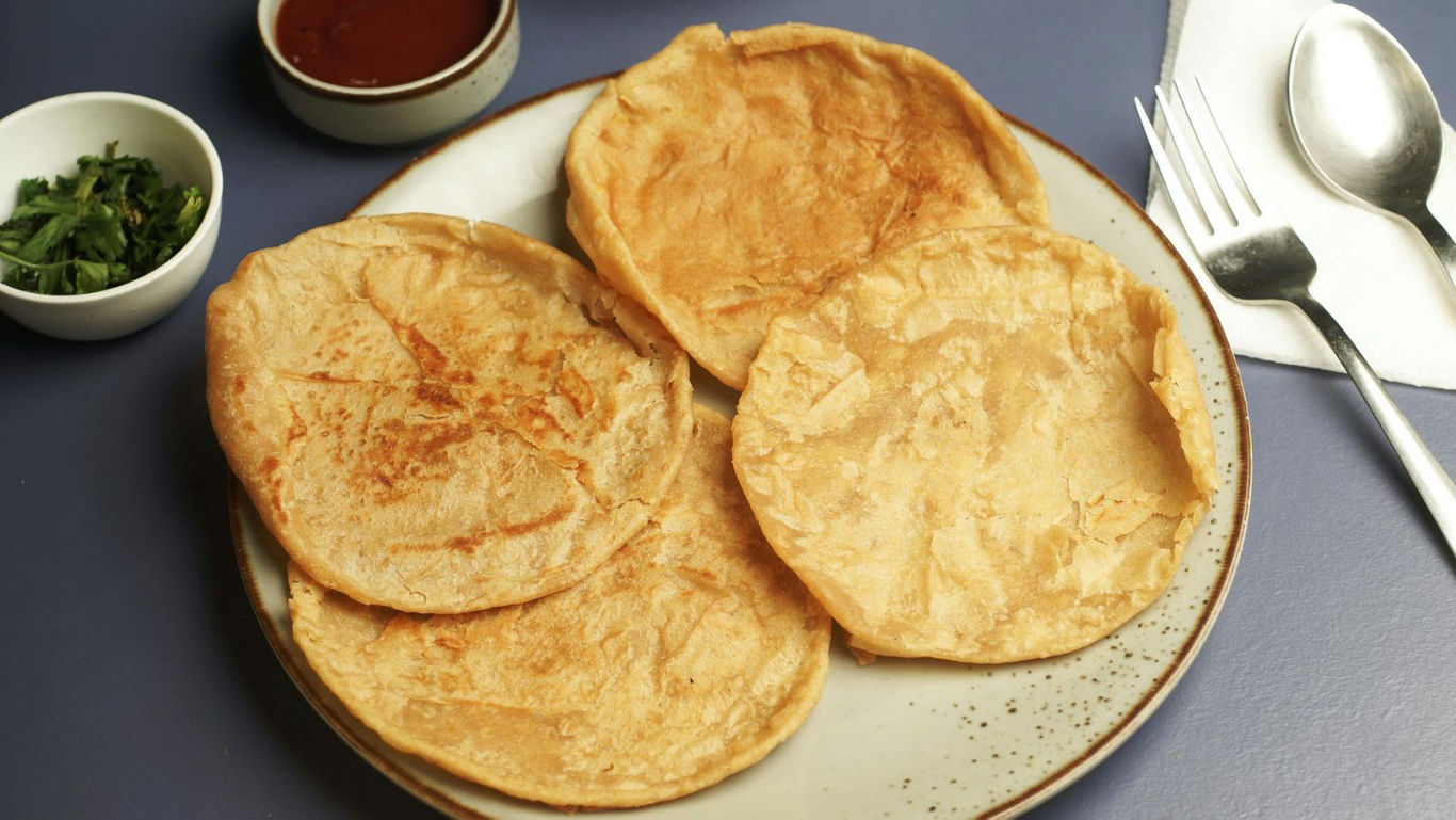 Freshly cooked flatbreads on a plate