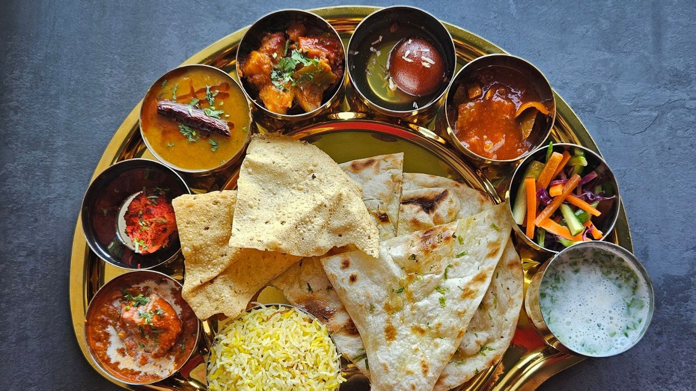 Traditional Indian thali with assorted dishes