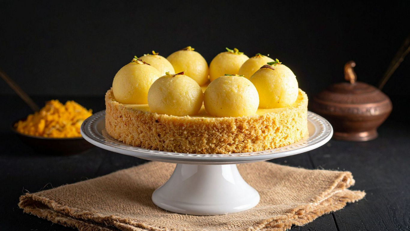 Elegant Indian dessert cake on stand