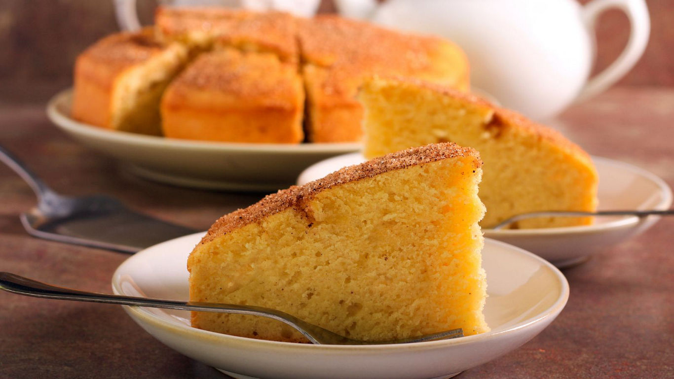 Slices of homemade sponge cake on plates