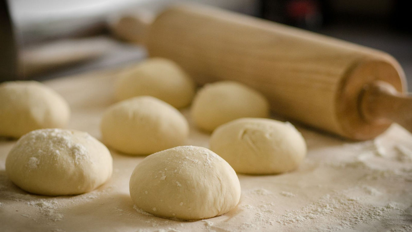 Fluffy golden luchis fried to perfection