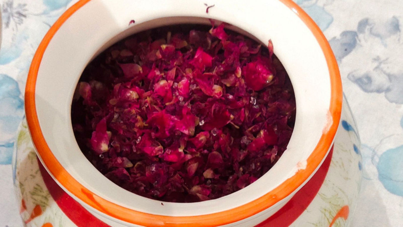 Bowl of chopped red flower petals