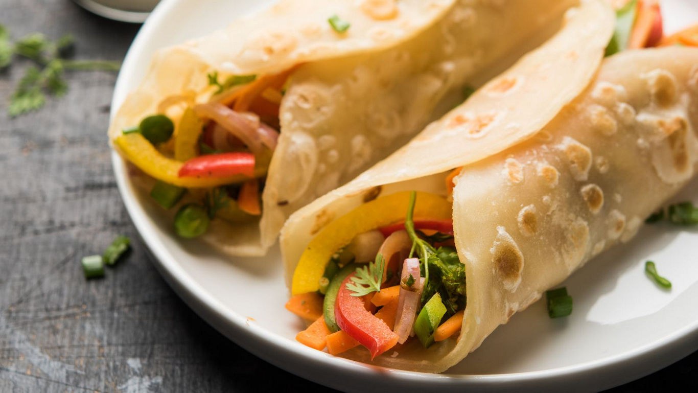 Vegetable wraps served on white ceramic plate