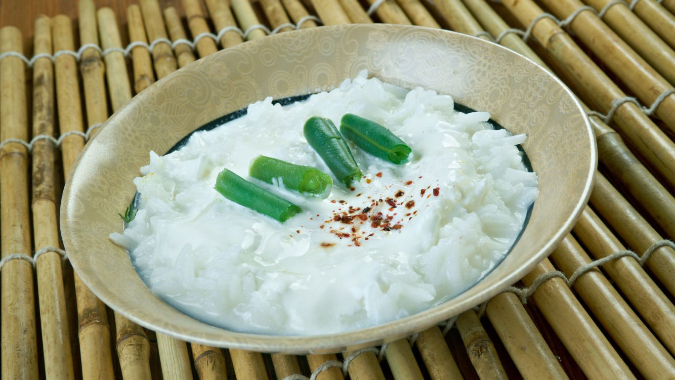 Rice in coconut milk with green beans and spices