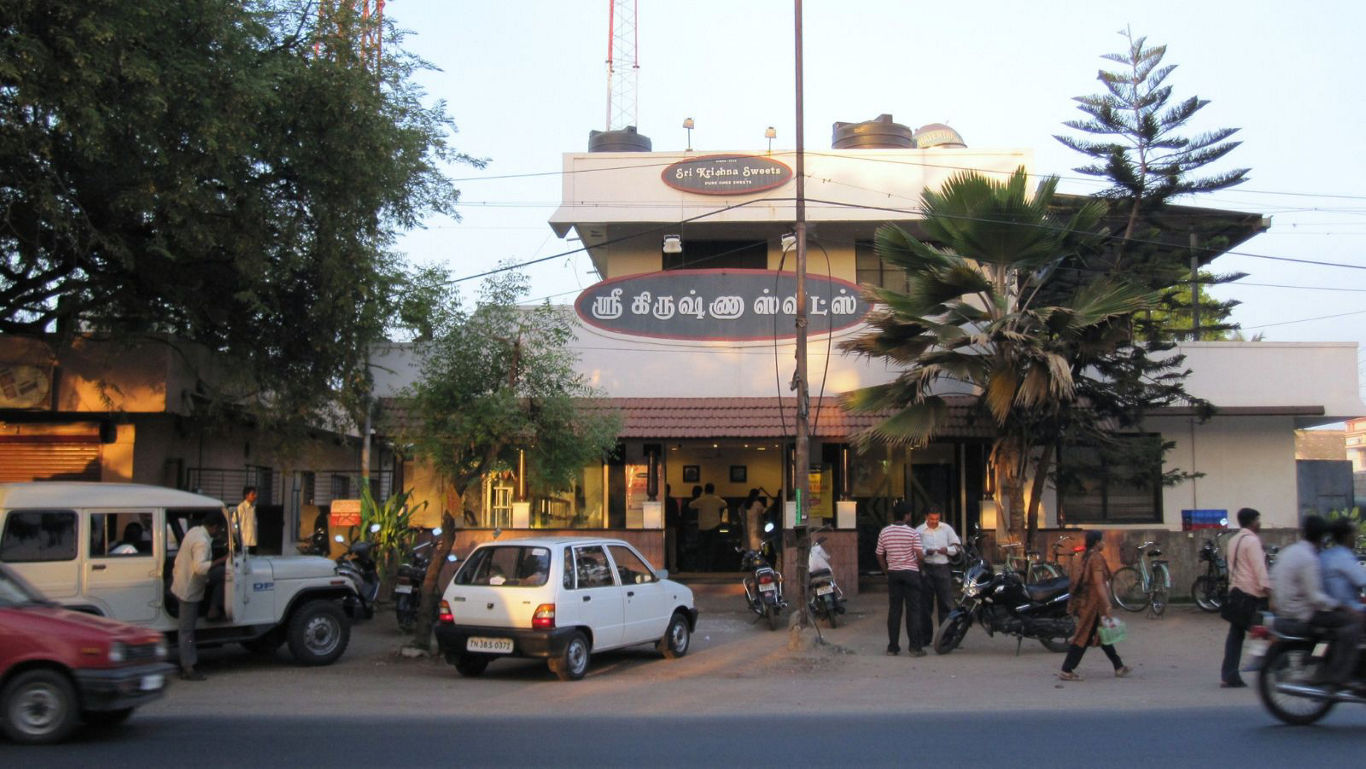 Busy South Indian Restaurant Exterior at Sunset