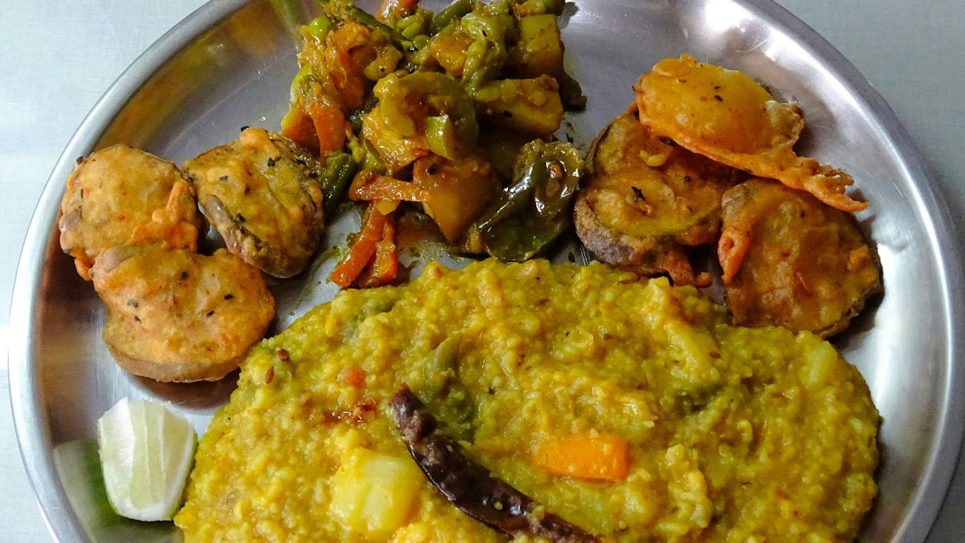 Traditional Indian meal with khichdi and vegetables