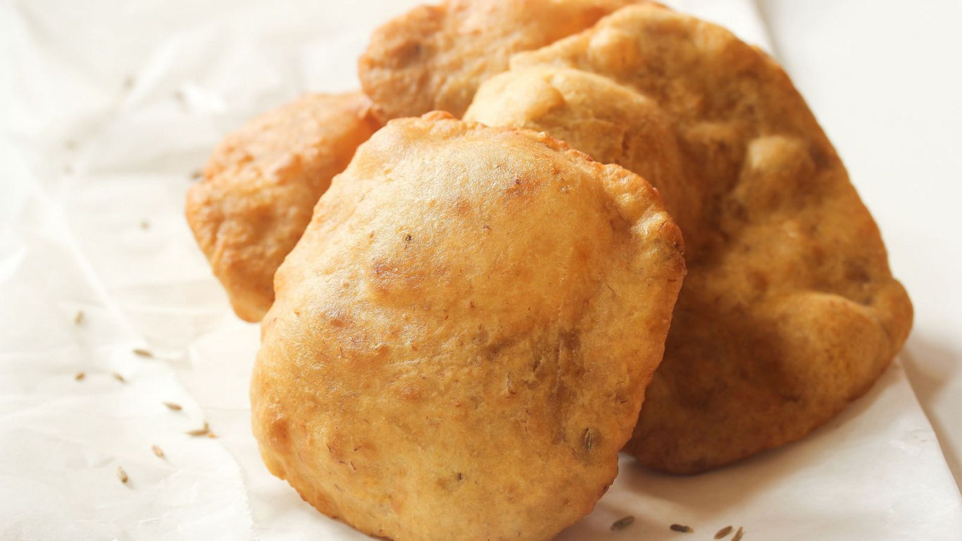 Golden fried bread on parchment paper
