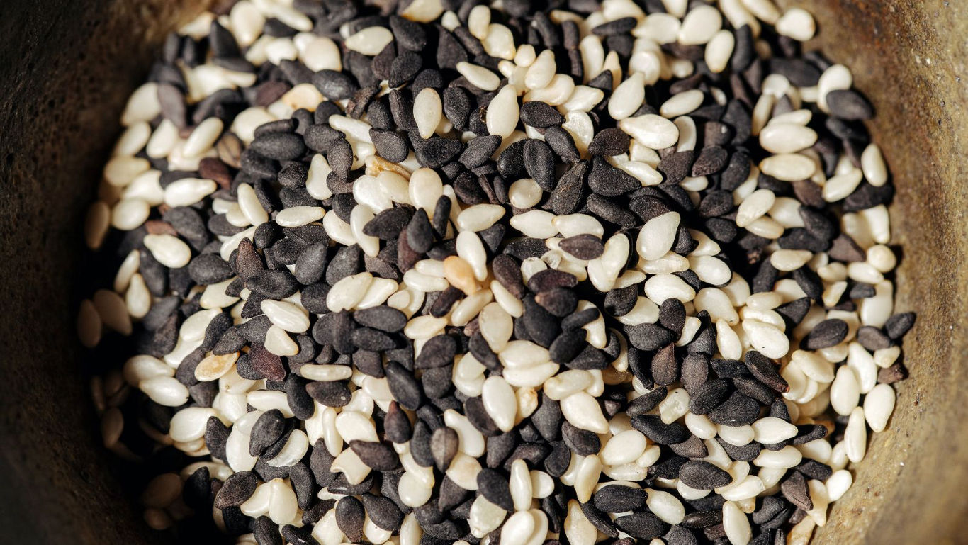 Closeup of mixed black and white sesame seeds