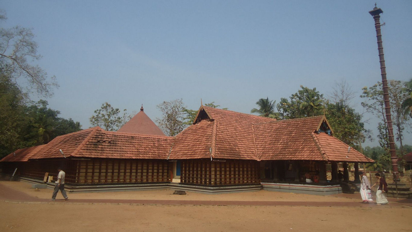 Traditional Kerala temple with tiled roof
