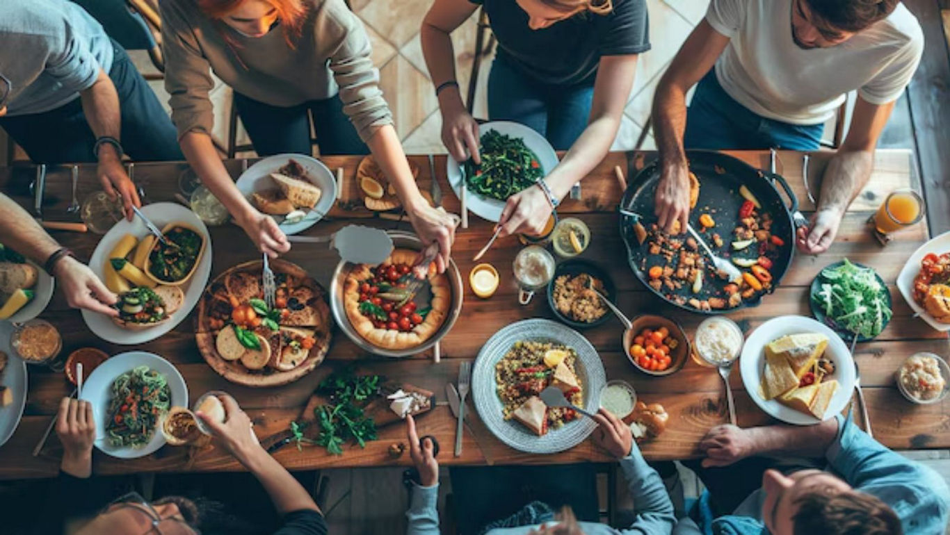 Group enjoying vibrant shared meal together