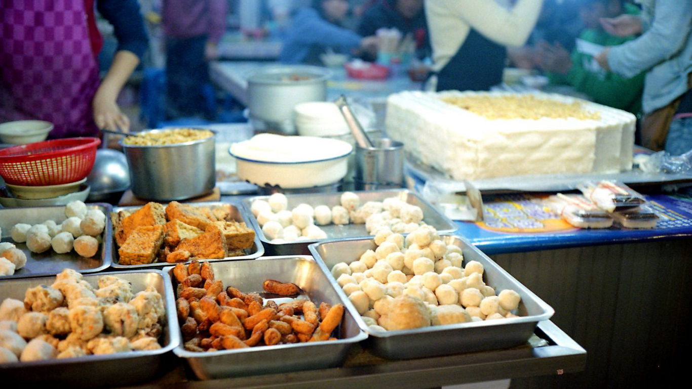 Street food stall with assorted snacks
