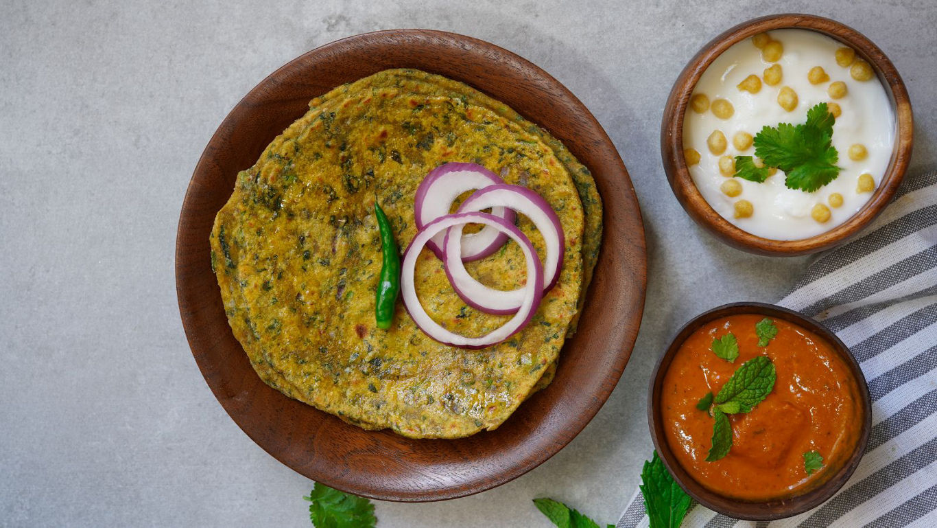 Indian flatbread with chutney and yogurt