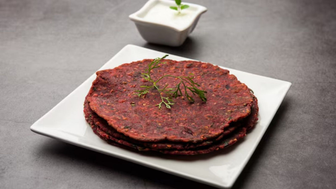 Stack of beetroot flatbreads with yogurt dip