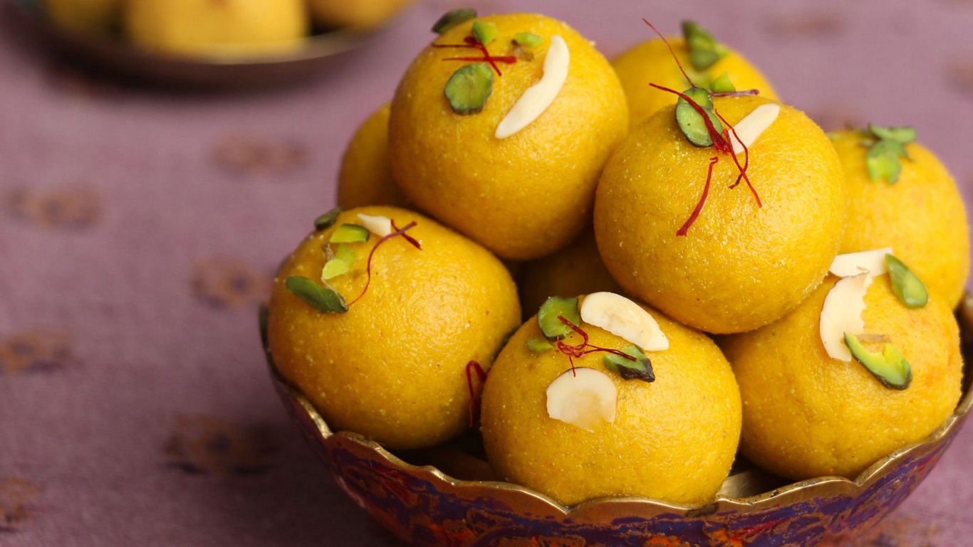 Traditional Indian sweets with nuts garnish