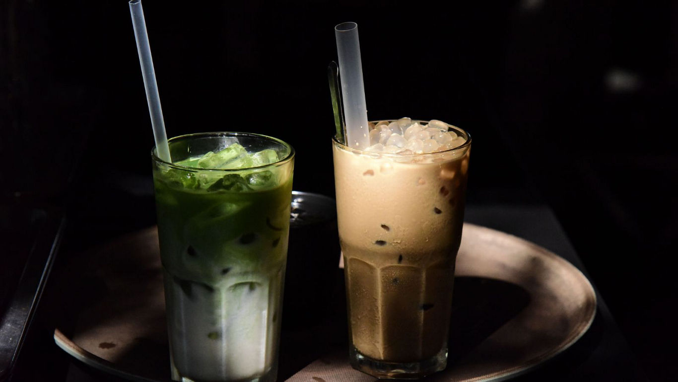 Iced matcha and coffee drinks in glass