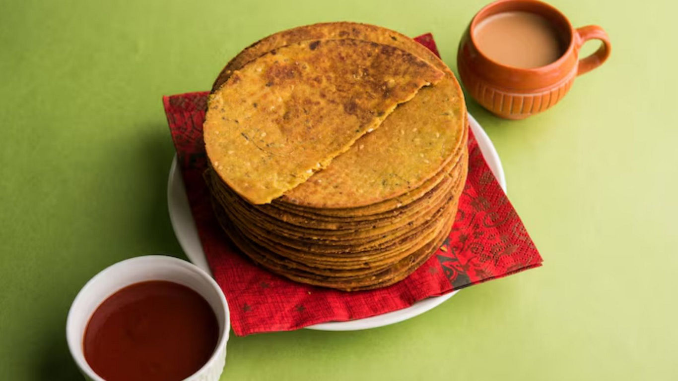 Stack of Indian Masala Khakhra with Tea and Chutney