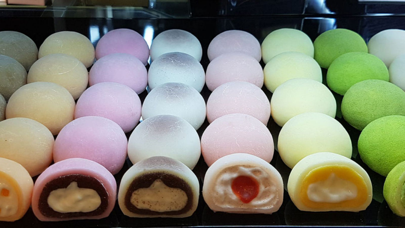 Assorted mochi ice cream balls in display case