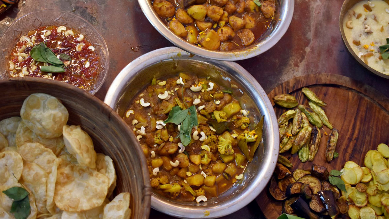 Assorted Indian vegetarian dishes on table