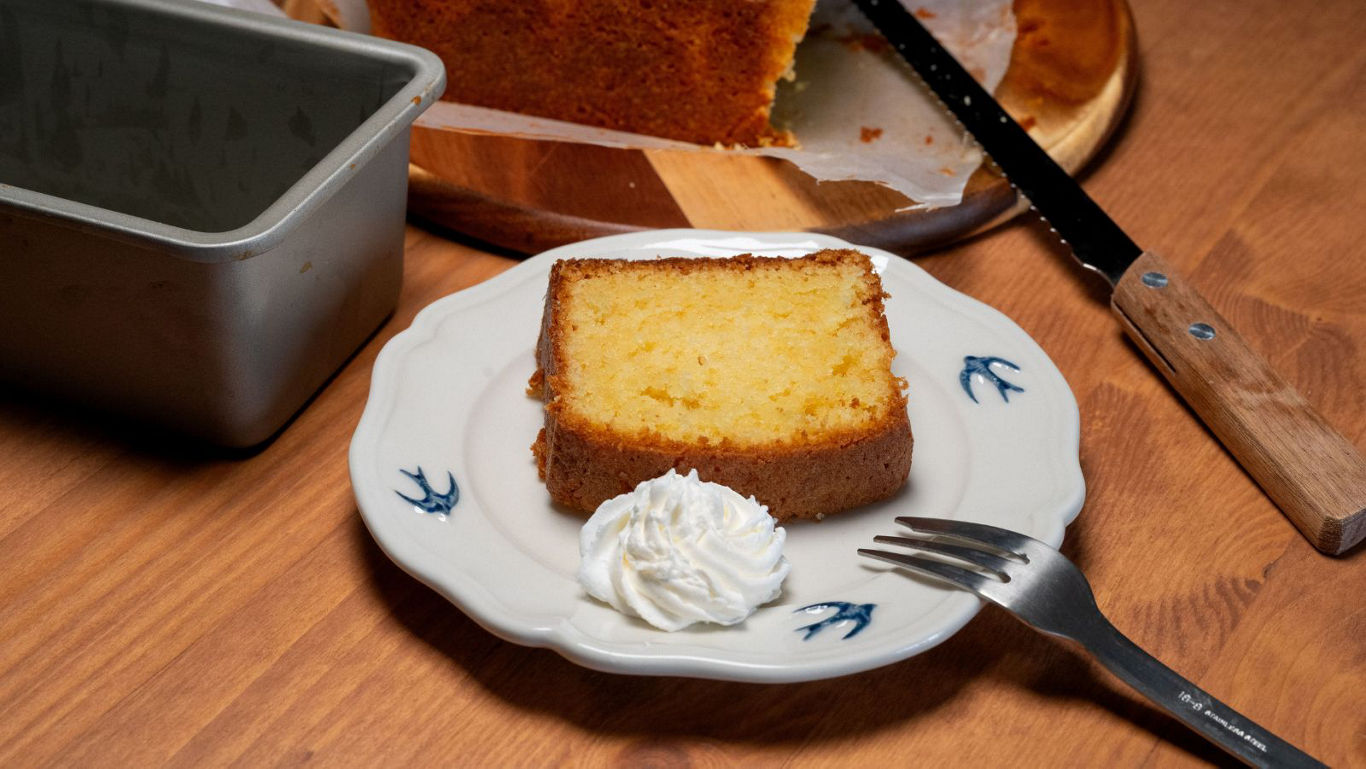 Slice of pound cake with whipped cream